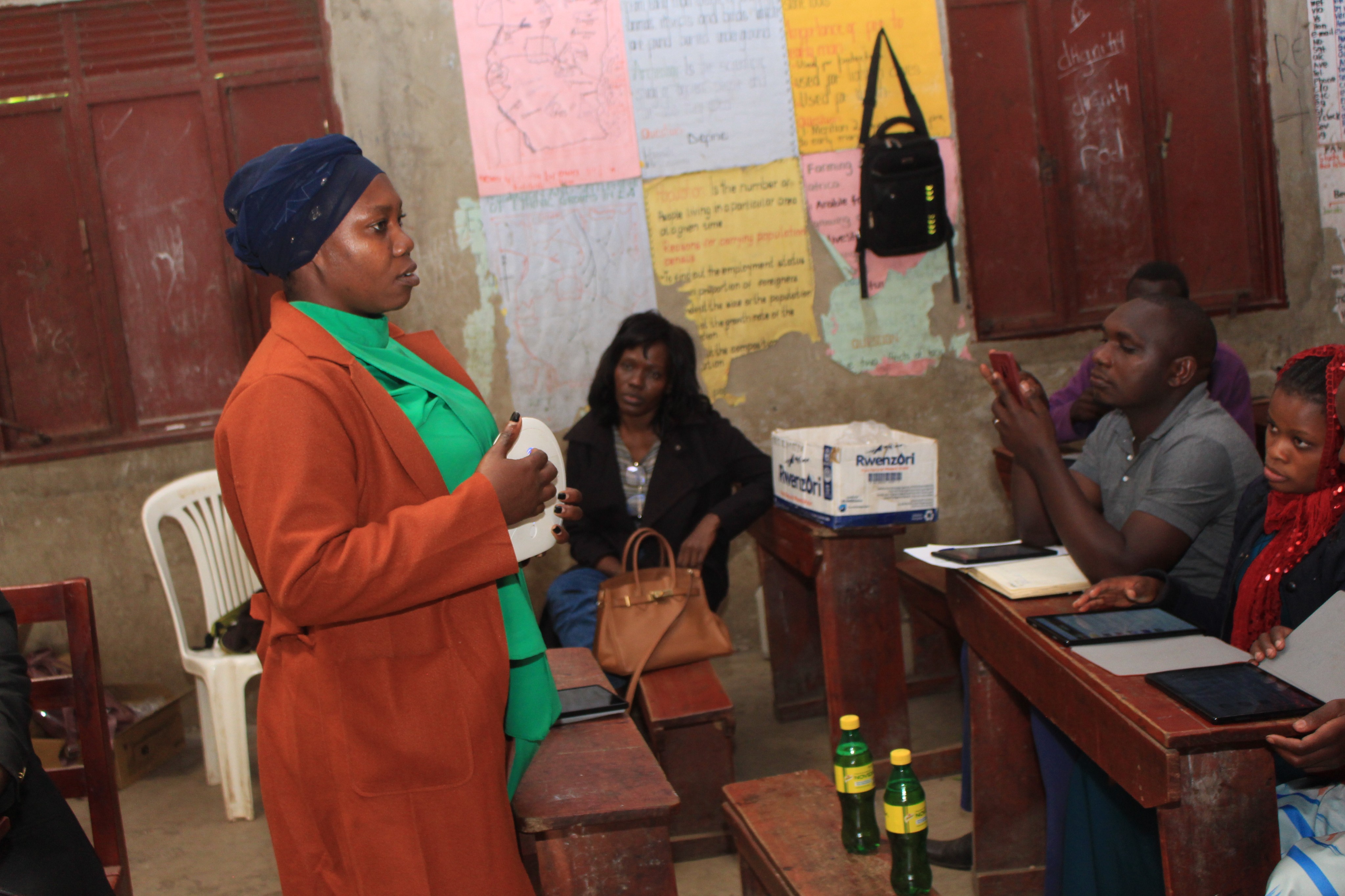 Teachers in a training session learning about e-learning tools